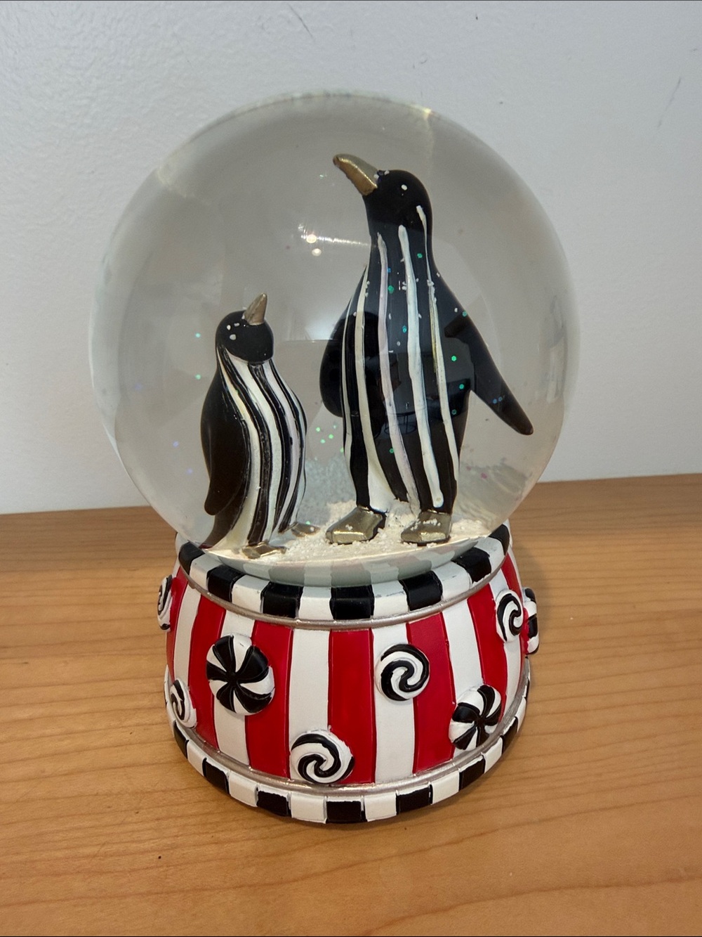 Mackenzie Childs
Checkmate Penguin Snow Globe/ Music Box
